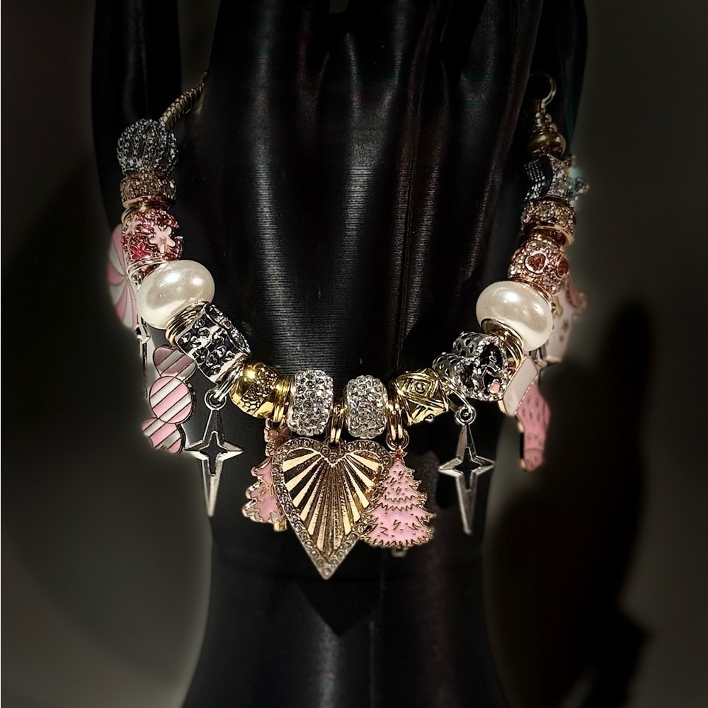 Elegant Gold and Silver Charm Bracelet